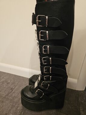 Demonia Black Over-The-Knee Platform Buckle Boots